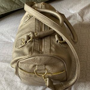 Steve Madden Distressed Gold Duffel Bag